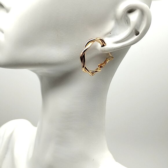 Gold-tone Twisted Hoop Earrings - Picture 8 of 13